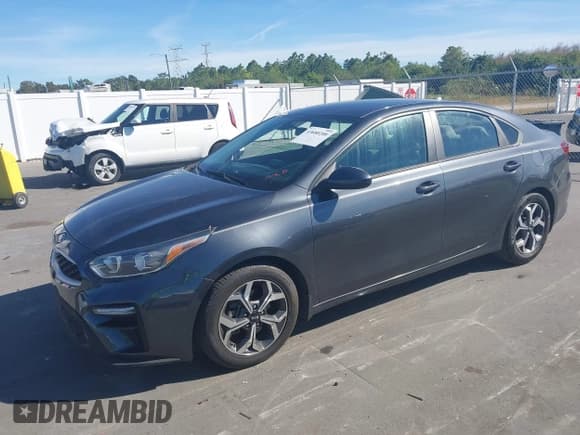 ✅ 2021 Kia Forte LXS • VIN: 3KPF24AD0ME309350 • Lot: 43680200. Wystawiony na IAAI z przebiegiem 50 533 mil. Bezpłatny archiwum sprzedaży aukcyjnych z USA i szczegółowy raport historii pojazdu na DreamBid. Zdjęcie 2.