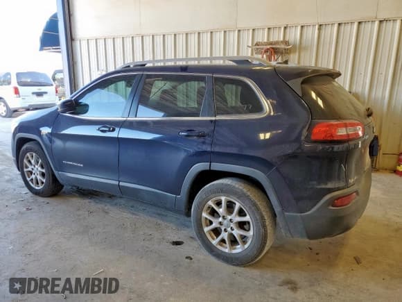 ✅ 2015 Jeep Cherokee Latitude • VIN: 1C4PJLCS4FW542301 • Lot: 92736675. Listed on Copart with 142,983 mi. Free auction sales archive from the USA and detailed vehicle history report at DreamBid. Image 2.