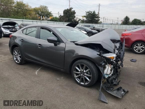 ✅ 2018 Mazda 3 Grand Touring • VIN: 3MZBN1W3XJM162747 • Lot: 81702815. Listed on Copart with 27,065 mi. Free auction sales archive from the USA and detailed vehicle history report at DreamBid. Image 4.