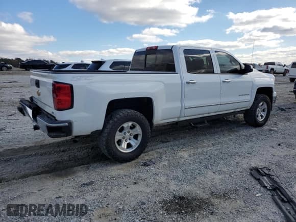 ✅ 2014 Chevrolet Silverado 1500 LTZ • VIN: 3GCUKSEC1EG254801 • Лот: 92074625. Опубликован ранее на Copart с пробегом 215 706 миль. Бесплатный доступ к архиву аукционных продаж из США и подробный отчёт об истории автомобиля на DreamBid. Изображение 3.
