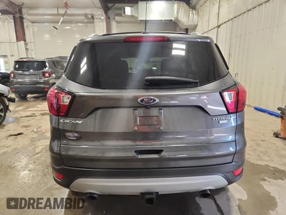 ✅ 2019 Ford Escape Titanium • VIN: 1FMCU9J94KUB13699 • Lot: 92007115. Listed on Copart with 46,521 mi. Free auction sales archive from the USA and detailed vehicle history report at DreamBid. Image 6.
