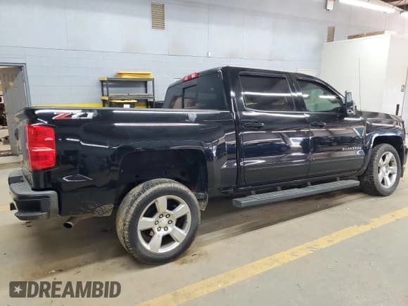 ✅ 2018 Chevrolet Silverado 1500 LT • VIN: 3GCUKREC5JG159841 • Лот: 70784224. Опубликован ранее на Copart с пробегом 110 665 миль. Бесплатный доступ к архиву аукционных продаж из США и подробный отчёт об истории автомобиля на DreamBid. Изображение 3.