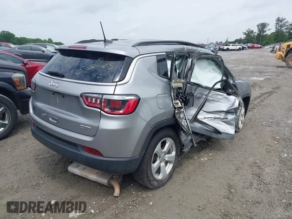 ✅ 2019 Jeep Compass Latitude • VIN: 3C4NJCBB3KT851086 • Lot: 42248059. Listed on IAAI with 149,351 mi. Free auction sales archive from the USA and detailed vehicle history report at DreamBid. Image 4.