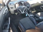 ✅ 2013 Hyundai Veloster w/Gray Int • VIN: KMHTC6AD9DU135593 • Lot: 79876314. Listed on Copart with 91,162 mi. Free auction sales archive from the USA and detailed vehicle history report at DreamBid. Image 8.