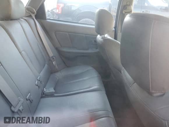 2006 Hyundai Elantra GLS z VIN KMHDN56D56U184066, wystawiony jako Copart lot #77399094 z przebiegiem 101 818 mil mil oraz Szkoda całkowita • Salvage title. Historia ofert i sprzedaży dostępna na DreamBid. Obrazek 10.