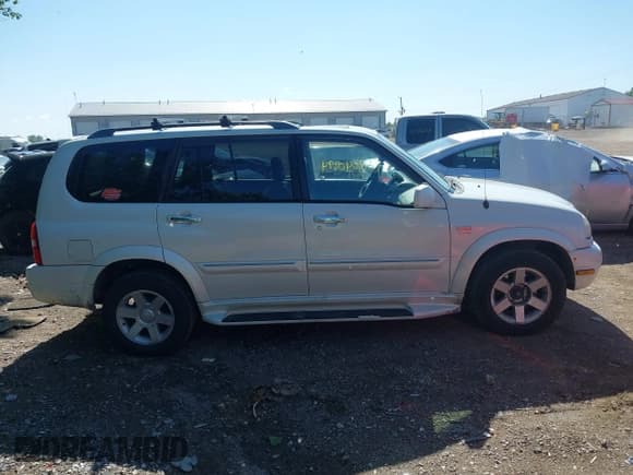 ✅ 2002 Suzuki XL7 Standard • VIN: JS3TX92VX24122111 • Lot: 42340894. Listed on IAAI with 250,309 mi. Free auction sales archive from the USA and detailed vehicle history report at DreamBid. Image 13.