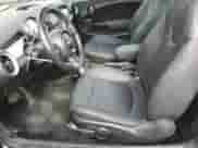 2013 MINI Hardtop z VIN WMWSU3C50DT683566, wystawiony jako Copart lot #59854505 z przebiegiem 136 288 mil mil oraz Szkoda całkowita • Salvage title. Historia ofert i sprzedaży dostępna na DreamBid. Obrazek 7.