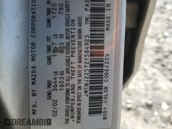 ✅ 2002 Mazda Protege DX • VIN: JM1BJ225721584923 • Лот: 82630595. Опубликован ранее на Copart с пробегом 179 288 миль. Бесплатный доступ к архиву аукционных продаж из США и подробный отчёт об истории автомобиля на DreamBid. Изображение 13.