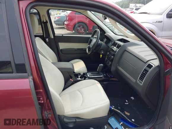 2010 Mercury Mariner Premier with VIN 4M2CN9HG2AKJ12271, listed as a IAAI auction lot 42896746 with 229,869 mi miles and . Bid and sale history available at DreamBid. Image 5.