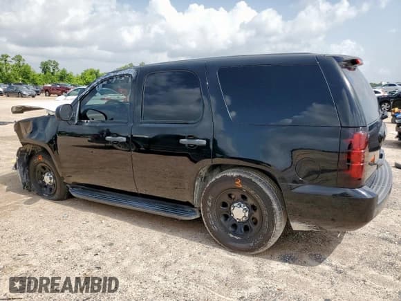 ✅ 2014 Chevrolet Tahoe Commercial • VIN: 1GNLC2E0XER219843 • Lot: 62381275. Listed on Copart with 200,626 mi. Free auction sales archive from the USA and detailed vehicle history report at DreamBid. Image 2.