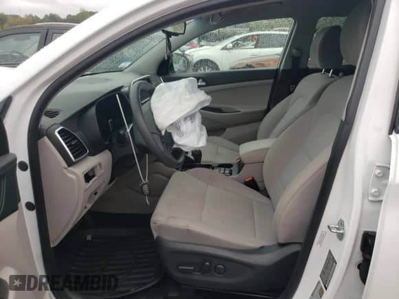 2021 Hyundai Tucson Value with VIN KM8J3CA41MU328214, listed as a Copart auction lot 83759975 with 61,891 mi miles and Salvage title. Bid and sale history available at DreamBid. Image 7.