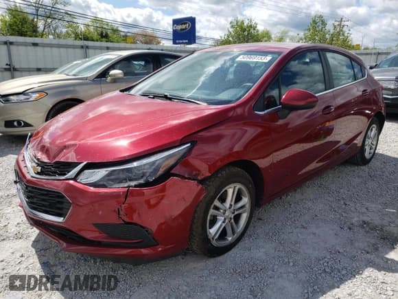 ✅ 2018 Chevrolet Cruze LT • VIN: 3G1BE6SM0JS634117 • Lot: 50969153. Listed on Copart with 99,385 mi. Free auction sales archive from the USA and detailed vehicle history report at DreamBid. Image 1.