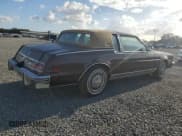 ✅ 1985 Oldsmobile Toronado Custom Brougham • VIN: 1G3EZ57Y6FE321802 • Lot: 77305454. Wystawiony na Copart z przebiegiem 51 559 mil. Bezpłatny archiwum sprzedaży aukcyjnych z USA i szczegółowy raport historii pojazdu na DreamBid. Zdjęcie 3.