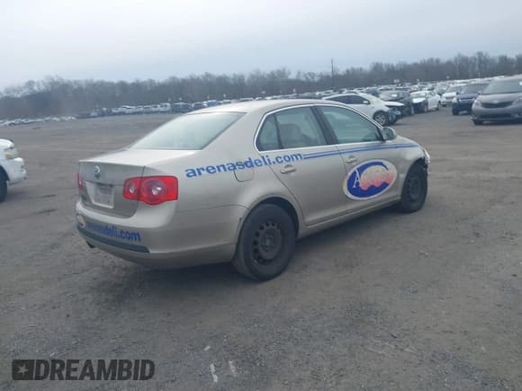 ✅ 2005 Volkswagen Jetta 2.5L • VIN: 3VWRF71K95M612973 • Lot: 41610256. Listed on IAAI with 124,458 mi. Free auction sales archive from the USA and detailed vehicle history report at DreamBid. Image 4.