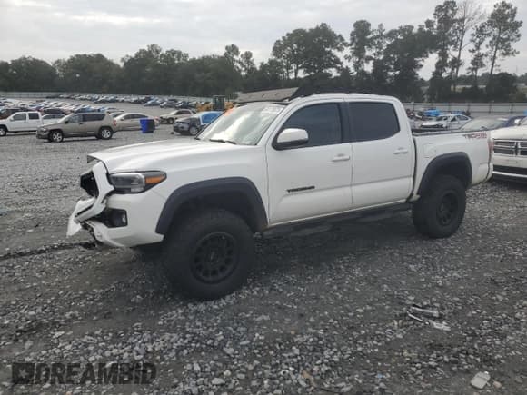 ✅ 2021 Toyota Tacoma TRD Off Road • VIN: 3TMCZ5AN1MM432190 • Лот: 84175875. Опубликован ранее на Copart с пробегом 68 818 миль. Бесплатный доступ к архиву аукционных продаж из США и подробный отчёт об истории автомобиля на DreamBid. Изображение 1.