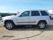 ✅ 2007 Jeep Grand Cherokee Laredo • VIN: 1J8GS48K87C663341 • Лот: 43636740. Опубликован ранее на IAAI с пробегом 198 156 миль. Бесплатный доступ к архиву аукционных продаж из США и подробный отчёт об истории автомобиля на DreamBid. Изображение 14.