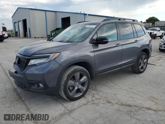 ✅ 2021 Honda Passport Touring • VIN: 5FNYF8H93MB028255 • Lot: 67320475. Listed on Copart with 92,692 mi. Free auction sales archive from the USA and detailed vehicle history report at DreamBid. Image 1.