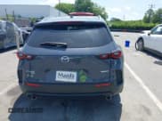 ✅ 2025 Mazda CX-50 S Premium • VIN: 7MMVABDM9SN320032 • Лот: 42546446. Опубликован ранее на IAAI с пробегом 28 051 миль. Бесплатный доступ к архиву аукционных продаж из США и подробный отчёт об истории автомобиля на DreamBid. Изображение 16.