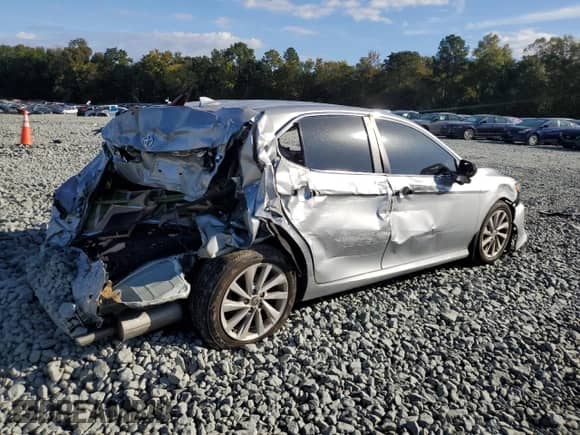 2023 Toyota Camry LE with VIN 4T1C11AK1PU121943, listed as a Copart auction lot 82264925 with 56,723 mi miles and Salvage title. Bid and sale history available at DreamBid. Image 3.