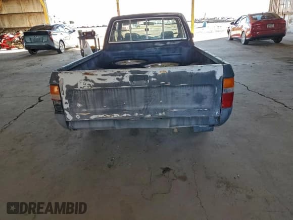 ✅ 1992 Toyota Pickup • VIN: JT4VN93D1N5031231 • Lot: 96236505. Listed on Copart with 176,030 mi. Free auction sales archive from the USA and detailed vehicle history report at DreamBid. Image 6.