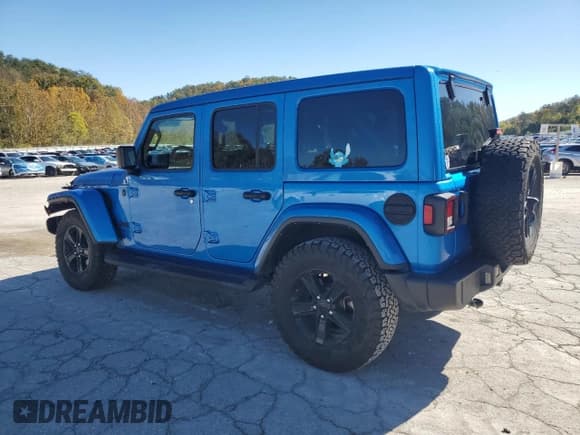 ✅ 2022 Jeep Wrangler Unlimited Sahara Altitude • VIN: 1C4HJXEGXNW105521 • Lot: 87063465. Listed on Copart with 86,243 mi. Free auction sales archive from the USA and detailed vehicle history report at DreamBid. Image 2.