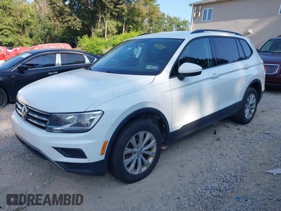 ✅ 2018 Volkswagen Tiguan S • VIN: 3VV0B7AX6JM119959 • Lot: 42967527. Listed on IAAI with 140,935 mi. Free auction sales archive from the USA and detailed vehicle history report at DreamBid. Image 2.