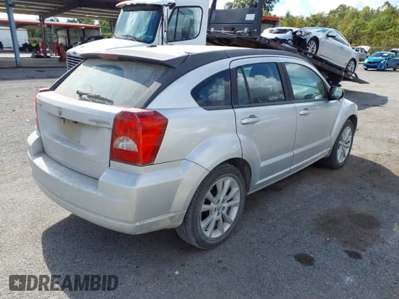 ✅ 2011 Dodge Caliber Heat • VIN: 1B3CB5HA6BD268095 • Lot: 43635863. Listed on IAAI with 222,849 mi. Free auction sales archive from the USA and detailed vehicle history report at DreamBid. Image 4.