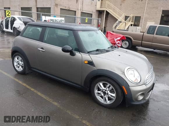 2012 MINI Hardtop with VIN WMWSU3C5XCT262971, listed as a IAAI auction lot 43359213 with 42,086 mi miles and . Bid and sale history available at DreamBid. Image 1.
