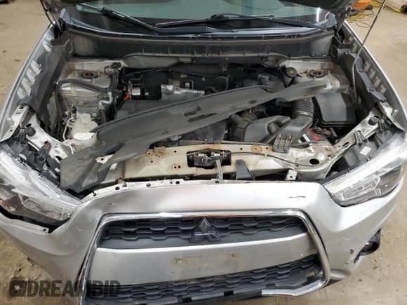 2013 Mitsubishi Outlander ES z VIN 4A4AR3AU4DE022503, wystawiony jako Copart lot #66431525 z przebiegiem 84 299 mil mil oraz Szkoda całkowita • Salvage title. Historia ofert i sprzedaży dostępna na DreamBid. Obrazek 12.