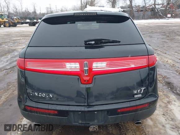 ✅ 2016 Lincoln MKT • VIN: 2LMHJ5NK8GBL00885 • Lot: 41561425. Listed on IAAI with 351,462 mi. Free auction sales archive from the USA and detailed vehicle history report at DreamBid. Image 16.