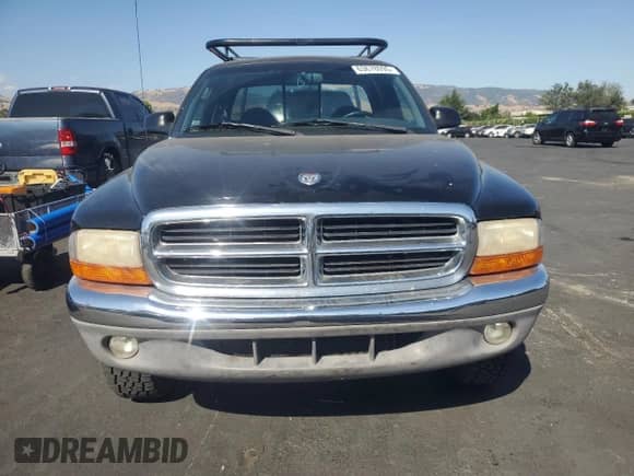 1999 Dodge Dakota SLT z VIN 1B7GG22X6XS166330, wystawiony jako Copart lot #63678095 z przebiegiem 241 272 mil mil oraz Szkoda całkowita • Salvage title. Historia ofert i sprzedaży dostępna na DreamBid. Obrazek 5.
