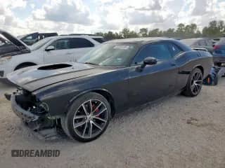 2014 Dodge Challenger R/T z VIN 2C3CDYBT9EH302255, wystawiony jako Copart lot #82254105 z przebiegiem 87 940 mil mil oraz Szkoda całkowita • Salvage title. Historia ofert i sprzedaży dostępna na DreamBid. Obrazek 1.