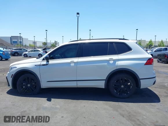 ✅ 2022 Volkswagen Tiguan SE R-Line Black • VIN: 3VVCB7AX3NM073218 • Лот: 42254388. Опубликован ранее на IAAI с пробегом 31 998 миль. Бесплатный доступ к архиву аукционных продаж из США и подробный отчёт об истории автомобиля на DreamBid. Изображение 14.