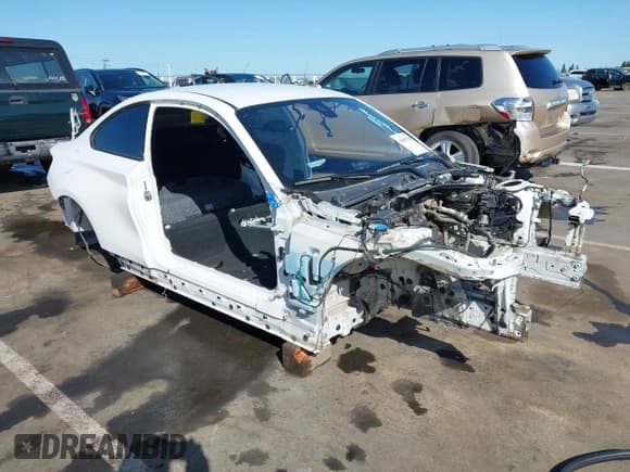 ✅ 2018 BMW M2 • VIN: WBS1J5C5XJVD36311 • Лот: 41987128. Опубликован ранее на IAAI с пробегом Не указан. Бесплатный доступ к архиву аукционных продаж из США и подробный отчёт об истории автомобиля на DreamBid. Изображение 1.