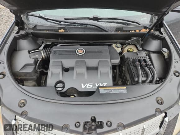 ✅ 2012 Cadillac SRX Performance Collection • VIN: 3GYFNBE30CS598950 • Lot: 81205505. Listed on Copart with 96,413 mi. Free auction sales archive from the USA and detailed vehicle history report at DreamBid. Image 12.