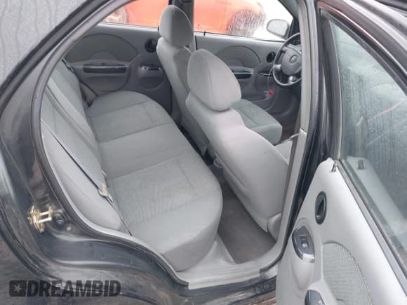 ✅ 2005 Chevrolet Aveo LT • VIN: KL1TG52605B480079 • Lot: 41757862. Wystawiony na IAAI z przebiegiem 163 561 mil. Bezpłatny archiwum sprzedaży aukcyjnych z USA i szczegółowy raport historii pojazdu na DreamBid. Zdjęcie 8.