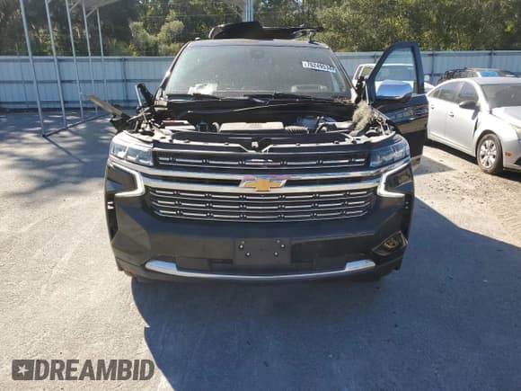 ✅ 2021 Chevrolet Suburban Premier • VIN: 1GNSKFKD6MR187162 • Lot: 76249534. Wystawiony na Copart z przebiegiem 42 017 mil. Bezpłatny archiwum sprzedaży aukcyjnych z USA i szczegółowy raport historii pojazdu na DreamBid. Zdjęcie 5.
