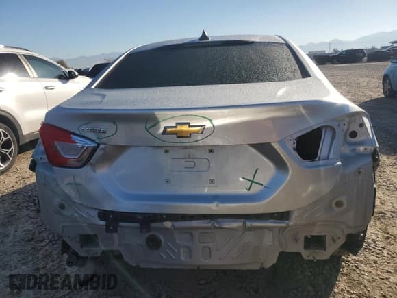 ✅ 2018 Chevrolet Cruze LS • VIN: 1G1BC5SM3J7203351 • Lot: 84962625. Listed on Copart with 56,771 mi. Free auction sales archive from the USA and detailed vehicle history report at DreamBid. Image 6.