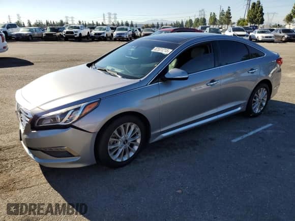 2015 Hyundai Sonata Limited с VIN 5NPE34AF2FH256031, выставлен на аукционе Copart как лот 82531215 с пробегом 72 085 миль миль и Списание • Salvage title. История ставок и продаж доступна на DreamBid. Изображение 1.
