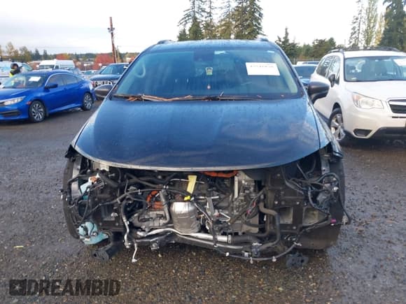 ✅ 2023 Chrysler Pacifica Hybrid Touring L • VIN: 2C4RC1L71PR589069 • Lot: 43541878. Listed on IAAI with 79,343 mi. Free auction sales archive from the USA and detailed vehicle history report at DreamBid. Image 13.