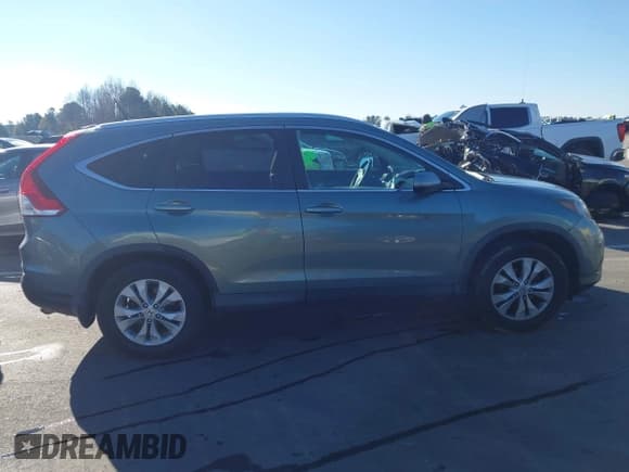 ✅ 2012 Honda CR-V EX-L • VIN: 2HKRM4H79CH628084 • Lot: 43835447. Listed on IAAI with 123,271 mi. Free auction sales archive from the USA and detailed vehicle history report at DreamBid. Image 13.