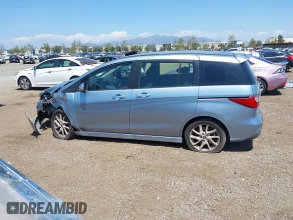 ✅ 2013 Mazda 5 Touring • VIN: JM1CW2CL8D0145628 • Lot: 42148184. Listed on IAAI with 137,150 mi. Free auction sales archive from the USA and detailed vehicle history report at DreamBid. Image 14.