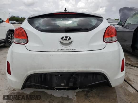 2012 Hyundai Veloster w/Red Int z VIN KMHTC6AD4CU055889, wystawiony jako Copart lot #62264394 z przebiegiem 138 504 mil mil oraz Szkoda całkowita • Salvage title. Historia ofert i sprzedaży dostępna na DreamBid. Obrazek 6.