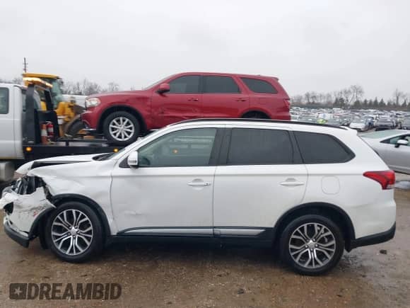 2016 Mitsubishi Outlander SE с VIN JA4AZ3A33GZ001552, выставлен на аукционе IAAI как лот 41712959 с пробегом 111 076 миль миль и . История ставок и продаж доступна на DreamBid. Изображение 14.