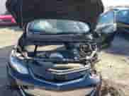 2017 Chevrolet Volt Premier z VIN 1G1RB6S5XHU203648, wystawiony jako IAAI lot #43468353 z przebiegiem Nie podano mil oraz . Historia ofert i sprzedaży dostępna na DreamBid. Obrazek 10.