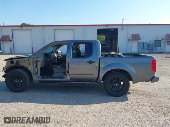 ✅ 2021 Nissan Frontier SV • VIN: 1N6ED0EA4MN707281 • Lot: 42385460. Listed on IAAI with 53,723 mi. Free auction sales archive from the USA and detailed vehicle history report at DreamBid. Image 14.