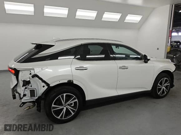 ✅ 2024 Lexus RX 350 • VIN: JTJCHMAA4R2013305 • Lot: 71052585. Listed on Copart with 25,901 mi. Free auction sales archive from the USA and detailed vehicle history report at DreamBid. Image 3.