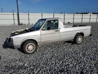 ✅ 1982 Volkswagen Rabbit • VIN: 1MB0174CV060266 • Lot: 49385145. Listed on Copart with 118,498 mi. Free auction sales archive from the USA and detailed vehicle history report at DreamBid. Image 1.