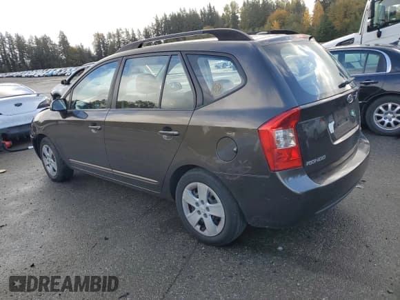 ✅ 2009 Kia Rondo LX • VIN: KNAFG528297269155 • Лот: 90724425. Опубликован ранее на Copart с пробегом 184 346 миль. Бесплатный доступ к архиву аукционных продаж из США и подробный отчёт об истории автомобиля на DreamBid. Изображение 2.