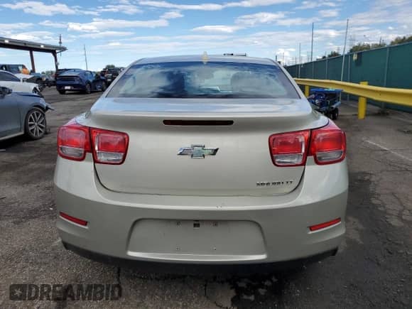 2014 Chevrolet Malibu LT z VIN 1G11C5SL3EF196710, wystawiony jako Copart lot #84640285 z przebiegiem 417 717 mil mil oraz Szkoda całkowita • Salvage title. Historia ofert i sprzedaży dostępna na DreamBid. Obrazek 6.